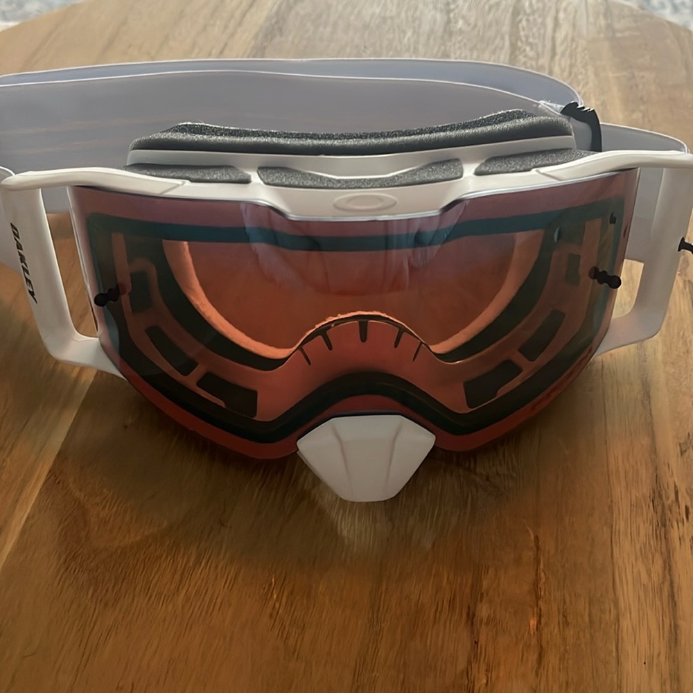 Oakley motocross prizm goggles.